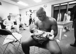 Mike Tyson Cradles his 2 mo. old son, Miguel, Memphis, TN, 2002, 16 x 20 inches, Ed. of 150