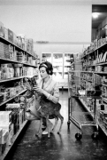 Audrey Hepburn at the market with Ip the deer, 1958