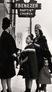 Coretta Scott King and her daughters, Yolanda and Bernice, talk with a fellow parishioner outside Ebenezer Baptist Church in Atlanta, 1963
