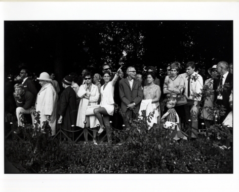 (Row of Spectators: Woman Point to the Sky), n.d., 11 x 14 Silver Gelatin Photograph