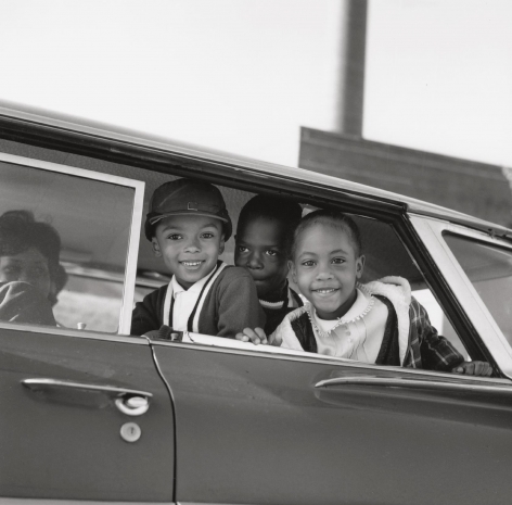 Michael Willis, Harry Williams, and Dwania Kyles sit in the back of a car during the first day of Memphis school integration, 1961, Archival Pigment Print