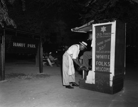 A shoeshine stand in Handy Park, named for composer W. C. Handy, n.d., Archival Pigment Print