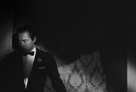 Rex Harrison peers ominously from the shadows on the set of &quot;Midnight Lace&quot;, 1960, Archival Pigment Print