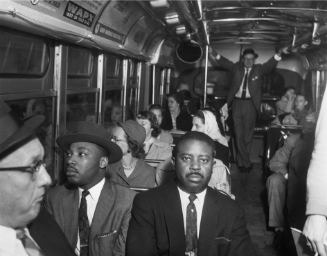Martin Luther King Jr. and Ralph Abernathy in the front row of a Montgomery, Alabama bus on the day that the city&#039;s public transit system was desegregated, n.d., Archival Pigment Print