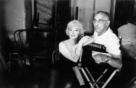 Marilyn Monroe and director George Cukor chat on the set of &quot;Let&rsquo;s Make Love&quot;, 1960, Archival Pigment Print