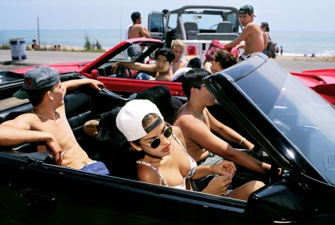 Mijanou, 18, who was voted Best Physique at Beverly Hills High School,&nbsp;skips class to go to the beach with friends on the annual Senior Beach Day, Santa Monica California, 1993, 26 3/4 x 40 Inches,&nbsp;Archival Pigment Print, Combined Edition of 25