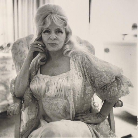 Diane Arbus Mae West in a chair at home, Santa Monica, CA., 1965